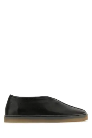 Black leather Linoleum slip ons
