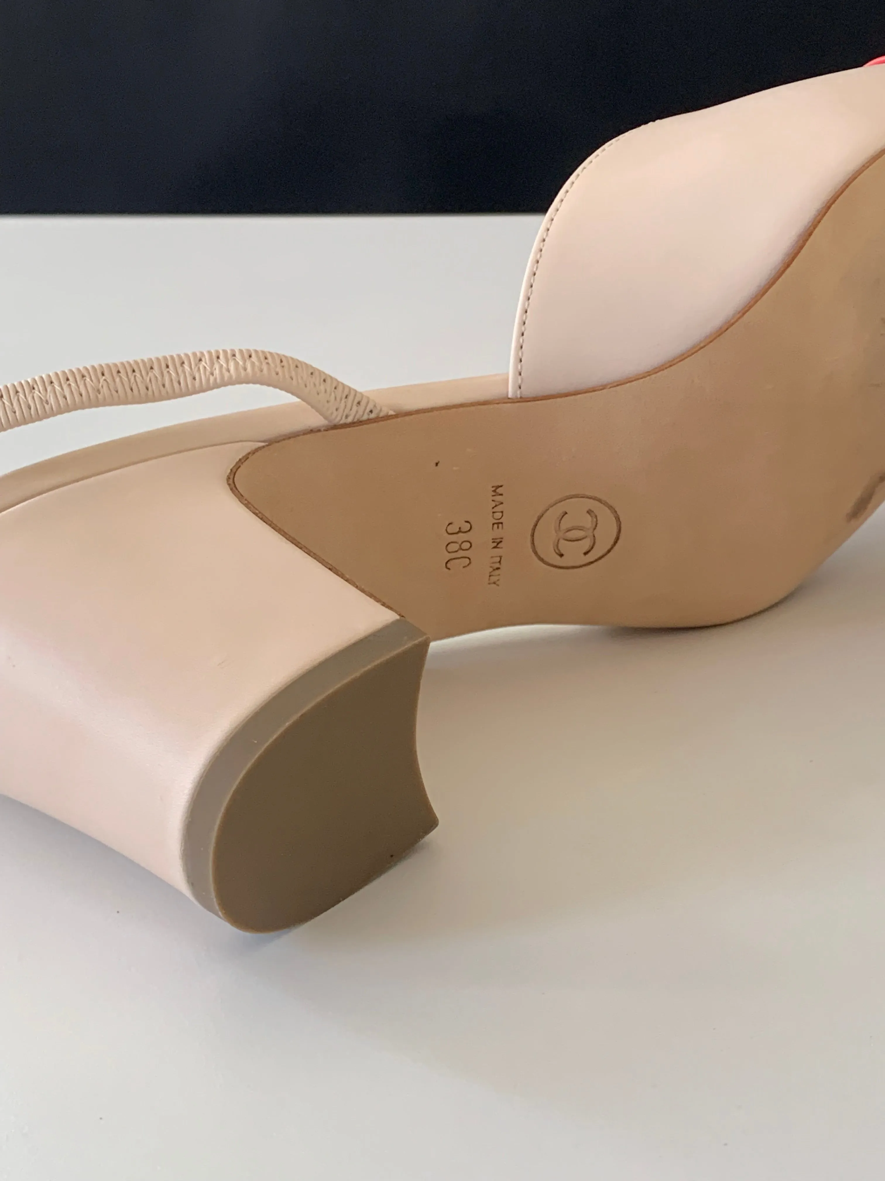 <b>CHANEL </b> <br>Cap Toe Slingback Pumps 38