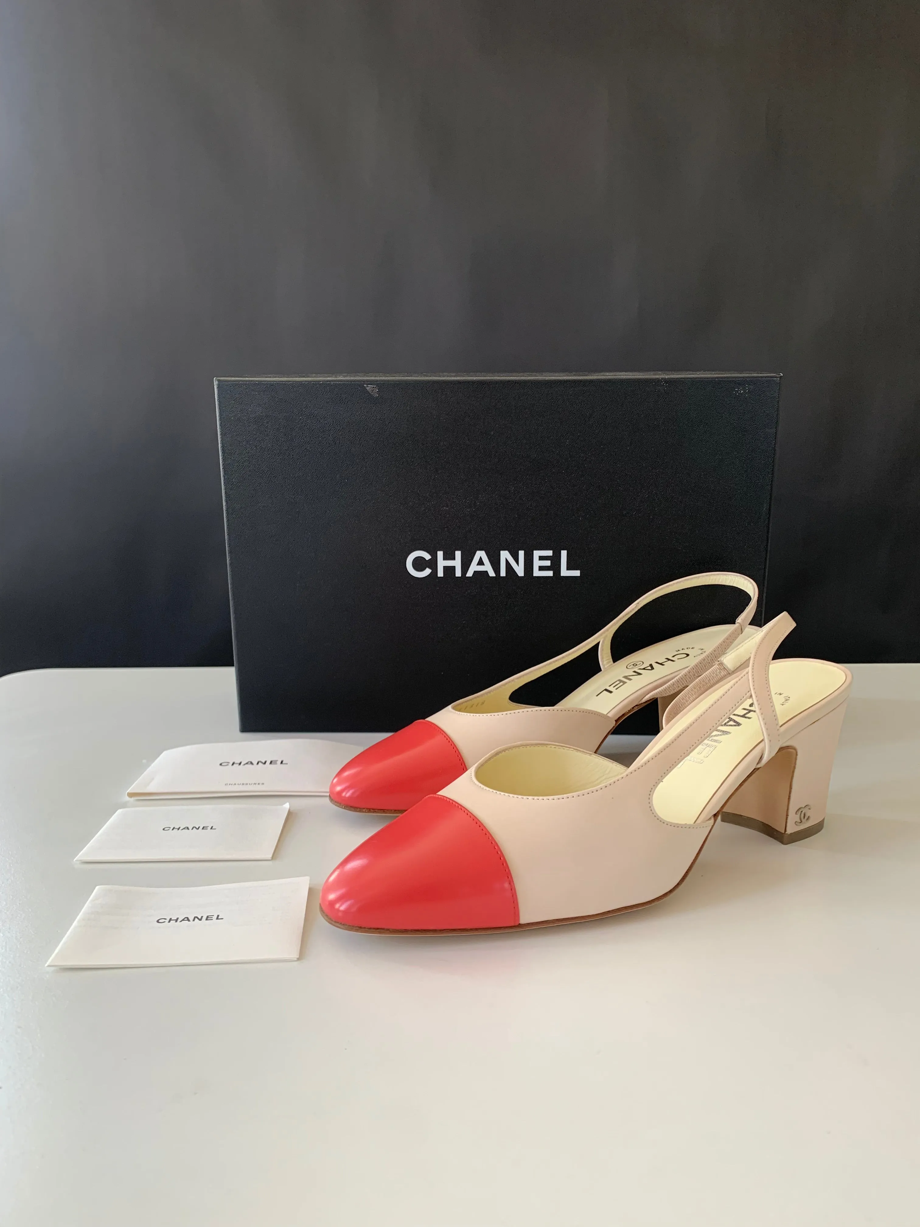 <b>CHANEL </b> <br>Cap Toe Slingback Pumps 38