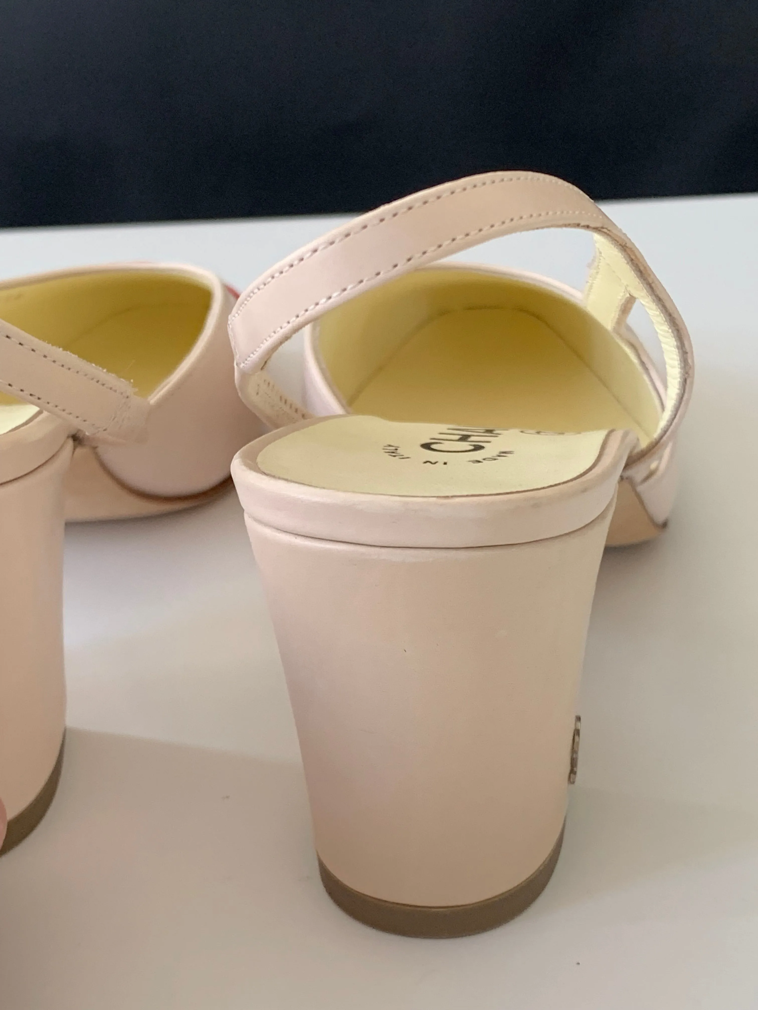 <b>CHANEL </b> <br>Cap Toe Slingback Pumps 38